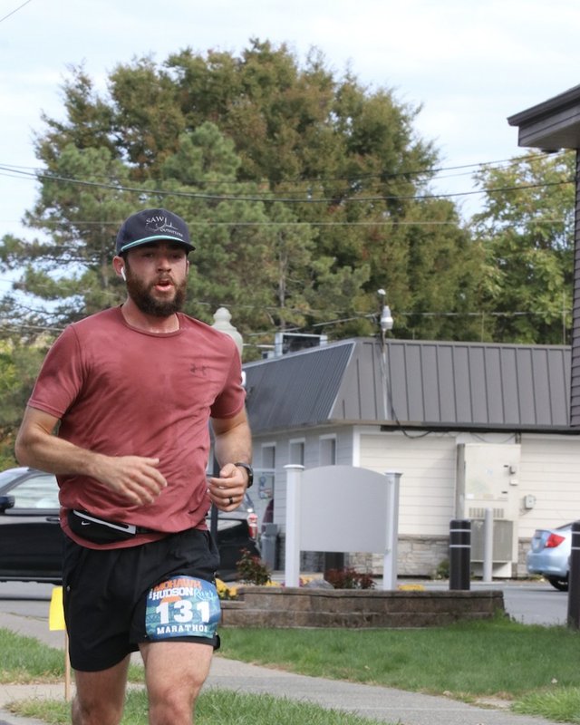 Brenden D. running the Mohawk Hudson Marathon in Albany, NY