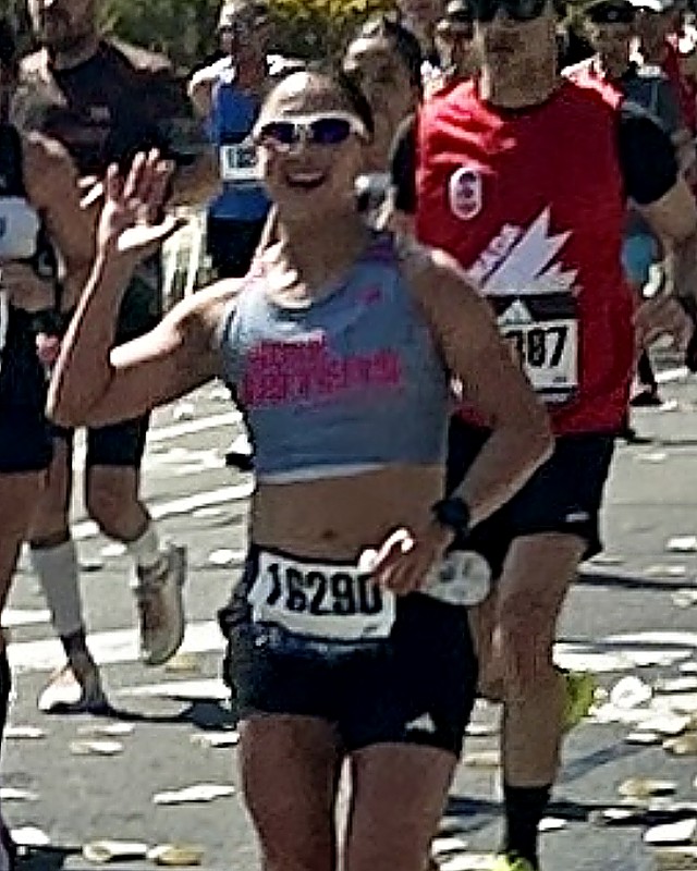 Tammy C. running the Boston Marathon in Boston, MA